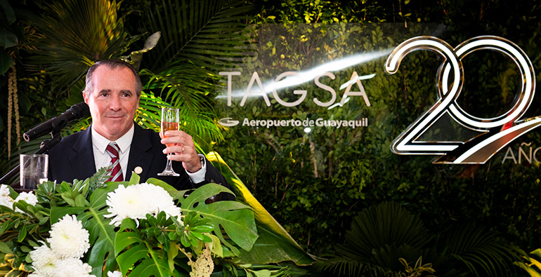 Ezequiel Barrenechea, President of TAGSA, raises a toast during the event celebratin the company's 20th anniversary.